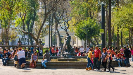 A public park in Mexico City. The city's ProAire program has dramatically cut air pollution through measures like expanded green space and public transit. Photo by Dale Cruse/Flickr