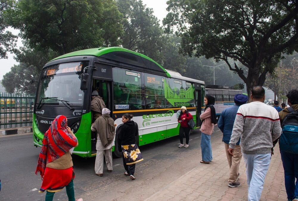 Passengers wait for an electric bus in Chandigarh, India